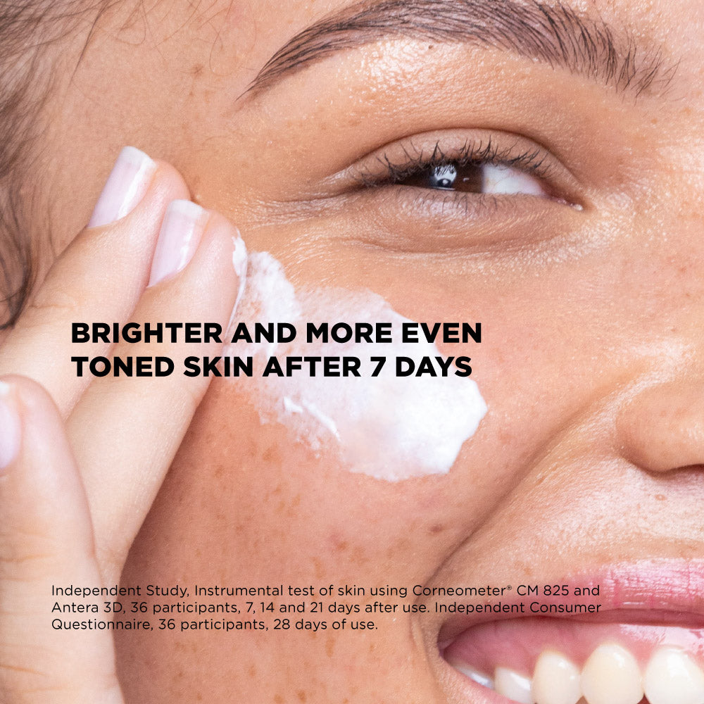 Close-up of a person applying a skincare product with text about skin improvement after 7 days.